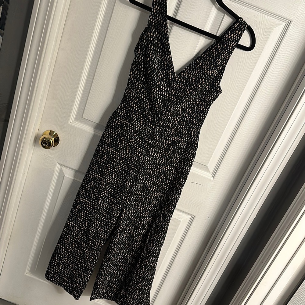 Navy cropped open back with tie jumpsuit size medium